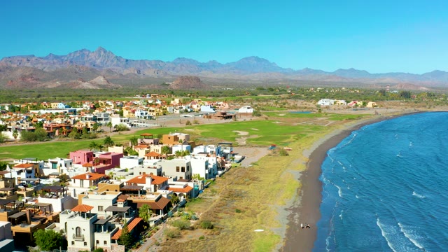 LORETO BCS MEXICO-2020: Coastal Town with Van Driving Along Black Sand Beach