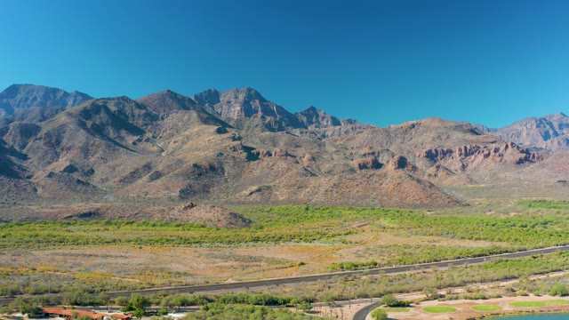 LORETO BCS MEXICO-2020: Road Through Mountain Valley with Distant Peaks