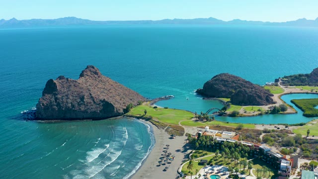 LORETO BCS MEXICO-2020: Coastal Landscape with Rocky Outcrop and Beachfront Development
