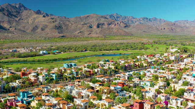 LORETO BCS MEXICO-2020: Residential Neighborhood with Colorful Homes, River, and Mountains
