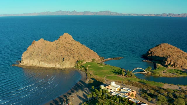 LORETO BCS MEXICO-2020: Rocky Island Near Beach with Moving Sun Shadows