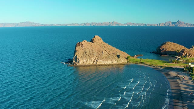 LORETO BCS MEXICO-2020: Rocky Outcrop and Calm Ocean by Sandy Beach
