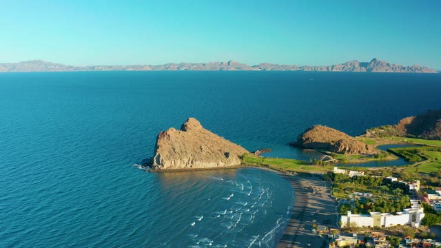 LORETO BCS MEXICO-2020: Rocky Outcrop and Sandy Beach with Ocean Waves
