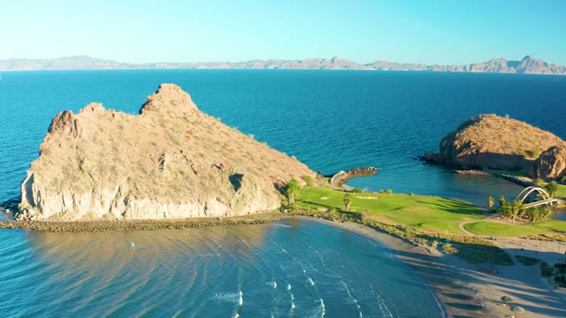 LORETO BCS MEXICO-2020: Rocky Shoreline with Calm Ocean and Sandy Beach