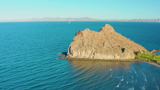 LORETO BCS MEXICO-2020: Rocky Island in Calm Ocean with Gentle Waves
