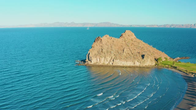 LORETO BCS MEXICO-2020: Rocky Outcrop by Calm Ocean and Sandy Shore