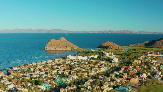 LORETO BCS MEXICO-2020: Coastal Town with Rocky Outcrop and Gentle Ocean Waves