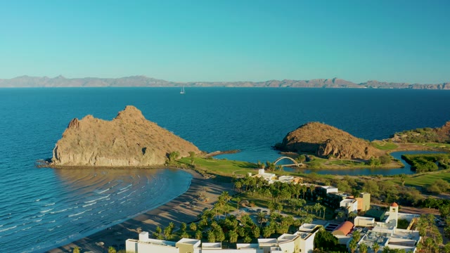 LORETO BCS MEXICO-2020: Rocky Coastline with Calm Ocean and Beachside Development