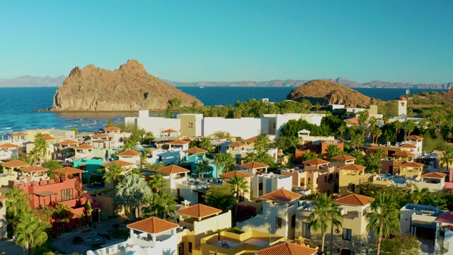 LORETO BCS MEXICO-2020: Coastal Residential Area with Rocky Outcrop and Palm Trees