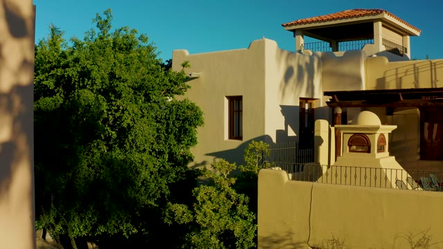 LORETO BCS MEXICO-2020: Residential Adobe Building and Shifting Tree Shadows