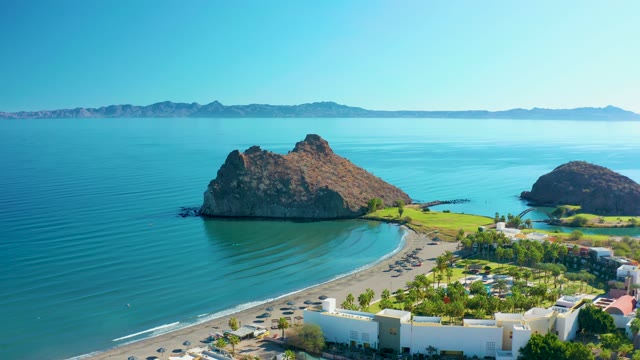 LORETO BCS MEXICO-2020: Coastal Road by Rocky Island and Calm Ocean