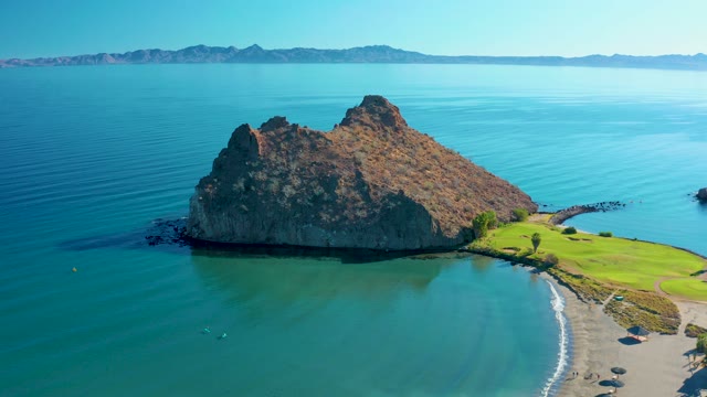 LORETO BCS MEXICO-2020: Rocky Outcrop by Sandy Beach with Shifting Water Patterns