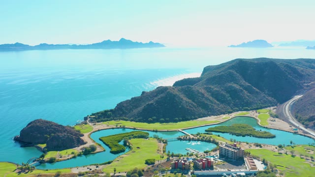 LORETO BCS MEXICO-2020: Coastal Landscape with Boat Wake and Road Traffic