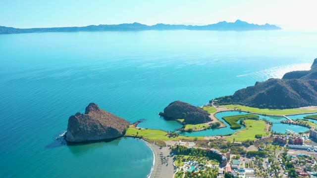 LORETO BCS MEXICO-2020: Coastal Landscape with Rocky Outcrops and Green Fields