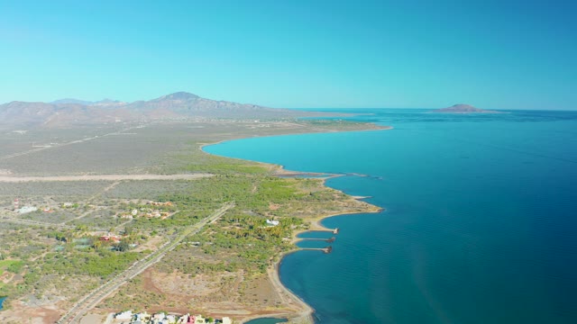 LORETO BCS MEXICO-2020: Coastal Road with Vehicle Moving Along Shore