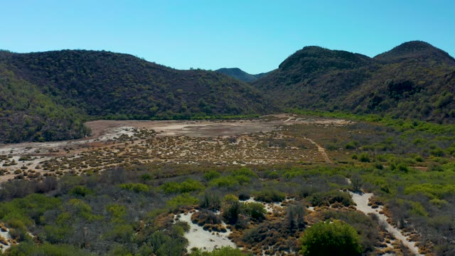 LORETO BCS MEXICO-2020: Dry Valley with Mountain Slopes and Sparse Vegetation