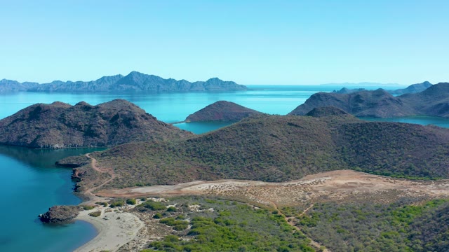 JUNCALITO BCS MEXICO-2020: A Person Walking Along a Coastal Beach