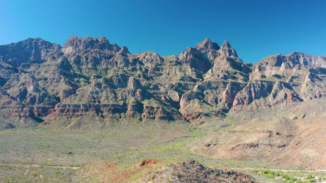 JUNCALITO BCS MEXICO-2020: Mountain Range Pan Across Desert Valley