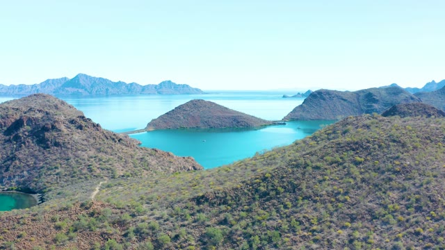 JUNCALITO BCS MEXICO-2020: Rocky Islands and Moving Boat in Coastal Waters