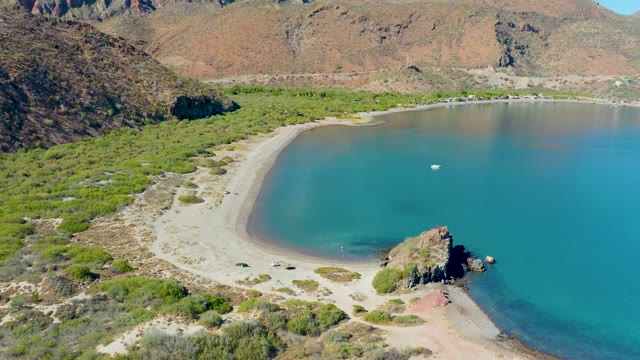 JUNCALITO BCS MEXICO-2020: Vehicles Driving on a Coastal Cove Beach