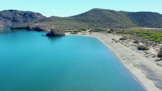 JUNCALITO BCS MEXICO-2020: Gentle Waves Lapping a Sandy Cove's Shoreline