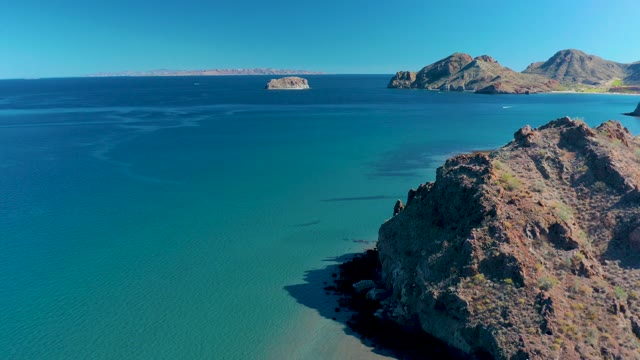 LIGUI BCS MEXICO-2020: Rocky Coastline with Turquoise Waters and Distant Islands