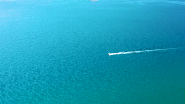 LIGUI BCS MEXICO-2020: Speeding Boat on Turquoise Ocean Waters