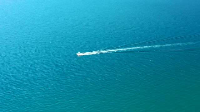 LIGUI BCS MEXICO-2020: Speedboat Creating White Wake on Calm Ocean