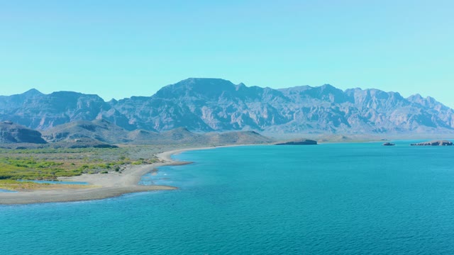 LIGUI BCS MEXICO-2020: Sandy Beach Meets Turquoise Ocean with Mountain Backdrop