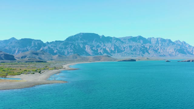 LIGUI BCS MEXICO-2020: Coastal Shore with Turquoise Water and Distant Mountains