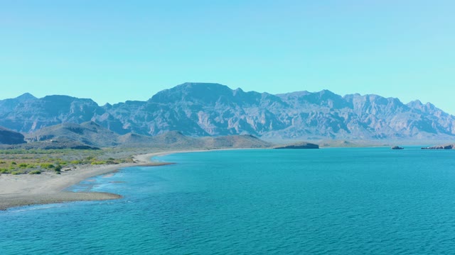 LIGUI BCS MEXICO-2020: Sandy Shore, Turquoise Water, and Mountain Backdrop