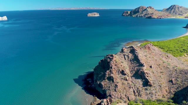 LIGUI BCS MEXICO-2020: Rocky Coastline with Turquoise Waters and Distant Islands