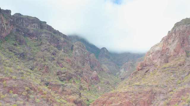 PUERTO ESCONDIDO BCS MEXICO-2020: Clouds Drifting Over Rocky Mountain Valley