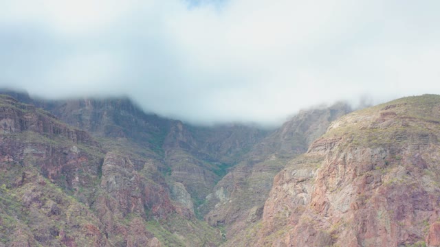 PUERTO ESCONDIDO BCS MEXICO-2020: Clouds Drifting over Rugged Mountain Valley