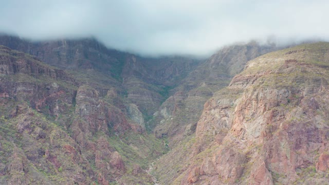 PUERTO ESCONDIDO BCS MEXICO-2020: Clouds Drifting Over Rugged Mountain Valley