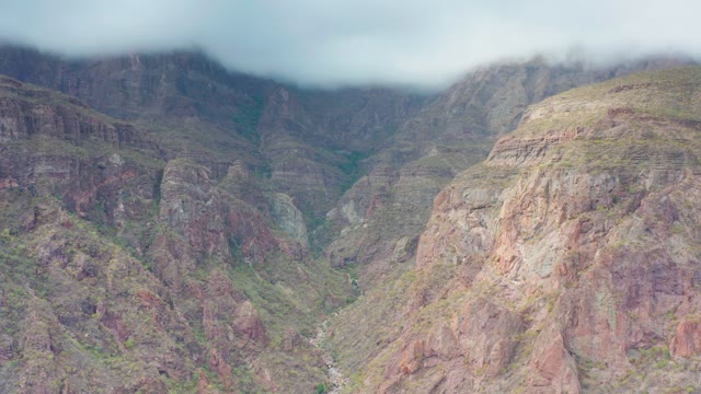PUERTO ESCONDIDO BCS MEXICO-2020: Clouds Drift over Mountain Valley with River