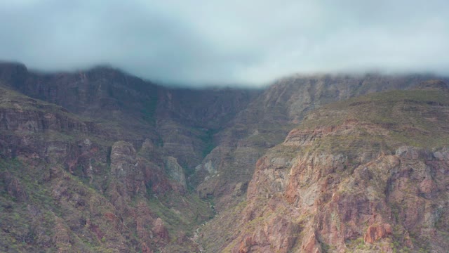 PUERTO ESCONDIDO BCS MEXICO-2020: Mountain Valley with Clouds Drifting Over Peaks
