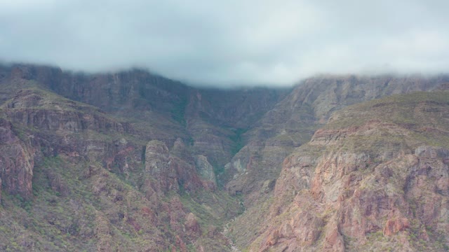 PUERTO ESCONDIDO BCS MEXICO-2020: Clouds Drifting over Rugged Mountain Valley