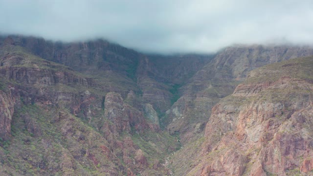 PUERTO ESCONDIDO BCS MEXICO-2020: Clouds Drifting over Rugged Mountain Valley
