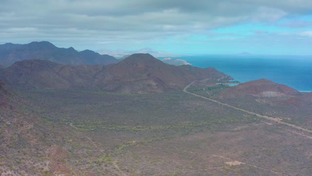PUERTO ESCONDIDO BCS MEXICO-2020: Vehicle Traveling on Coastal Mountain Road