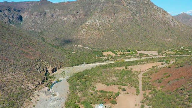 SAN JAVIER BCS MEXICO-2020: Valley with River and Changing Tent Structure