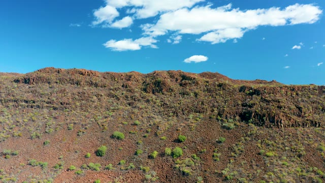 SAN JAVIER BCS MEXICO-2020: Arid Rocky Desert with Sparse Green Shrubs