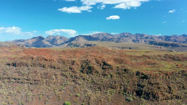 SAN JAVIER BCS MEXICO-2020: Red Rock Desert Valley and Distant Mountains