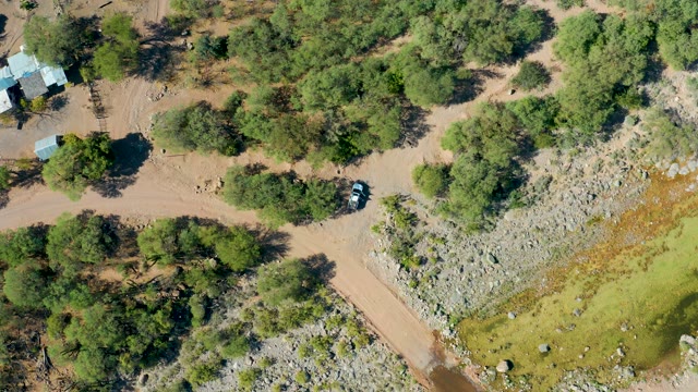 SAN JAVIER BCS MEXICO-2020: Rural Dirt Road with Trees and Small Structure