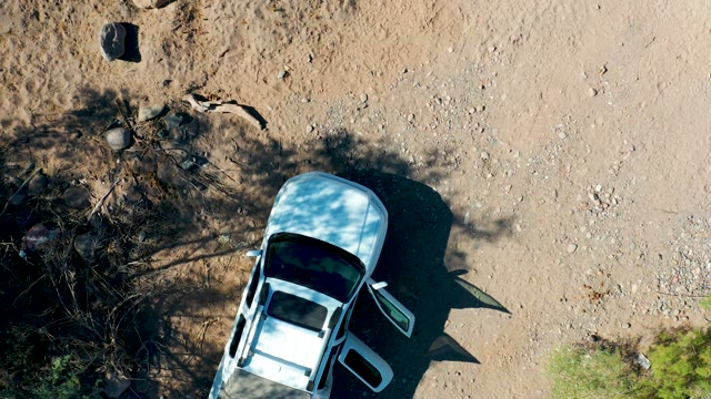 SAN JAVIER BCS MEXICO-2020: White Car Moving on Dirt Road