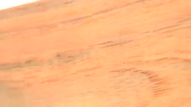 WESTMINSTER COLORADO-2015: A Piece of Yellow/Orange Metal Sheet Rotating