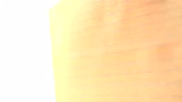 WESTMINSTER COLORADO-2015: Close Up Rotating Yellow Object Under White Light