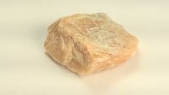WESTMINSTER COLORADO-2015: Rotating Yellow Sandstone Rock Under a White Light