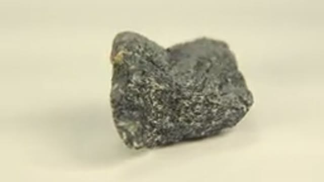 WESTMINSTER COLORADO-2015: Rotating Black Granite Rock on White Floor