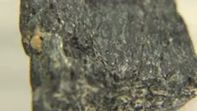 WESTMINSTER COLORADO-2015: Close Up Rotating Black And Brown Graphite Rock
